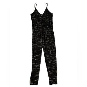 Veronica M Black Jumpsuit with horizontal patterned stripes
